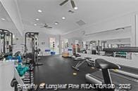 workout area with recessed lighting