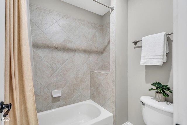 full bathroom featuring shower / bath combination with curtain and toilet