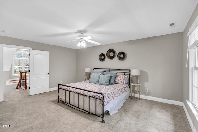 bedroom featuring carpet, baseboards, and ceiling fan