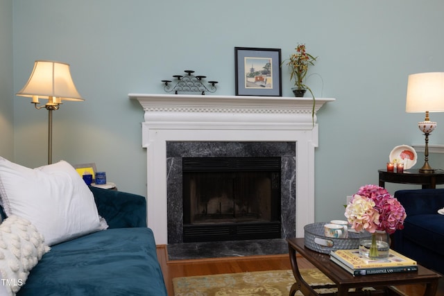 109 Perry Farms Dr, Apex, NC 27502 - living room with a premium fireplace and wood finished floors