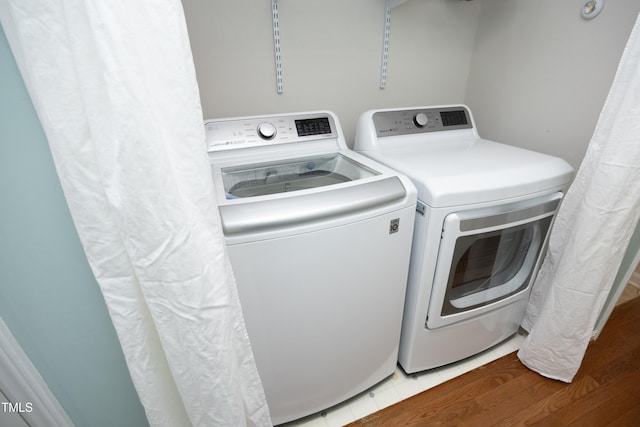 109 Perry Farms Dr, Apex, NC 27502 - laundry area with washer and clothes dryer
