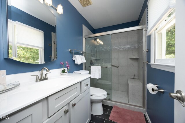 109 Perry Farms Dr, Apex, NC 27502 - full bath with toilet, vanity, a shower stall, and healthy amount of natural light