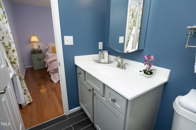 109 Perry Farms Dr, Apex, NC 27502 - bathroom featuring vanity, toilet, and wood finished floors