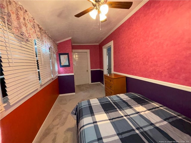 unfurnished bedroom with crown molding, ceiling fan, and carpet