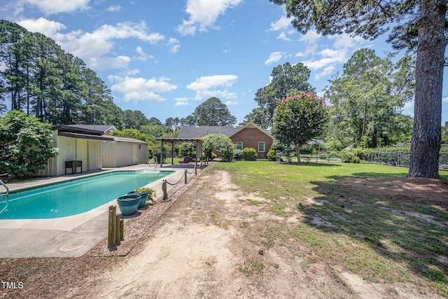 1901 E Mulberry St, Goldsboro, NC 27530 - outdoor pool featuring a pergola, view of wooded area, and a patio