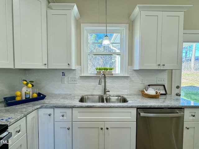 1572 Patterson Rd, Kinston, NC 28504 - kitchen featuring dishwasher, a sink, white cabinetry, and tasteful backsplash
