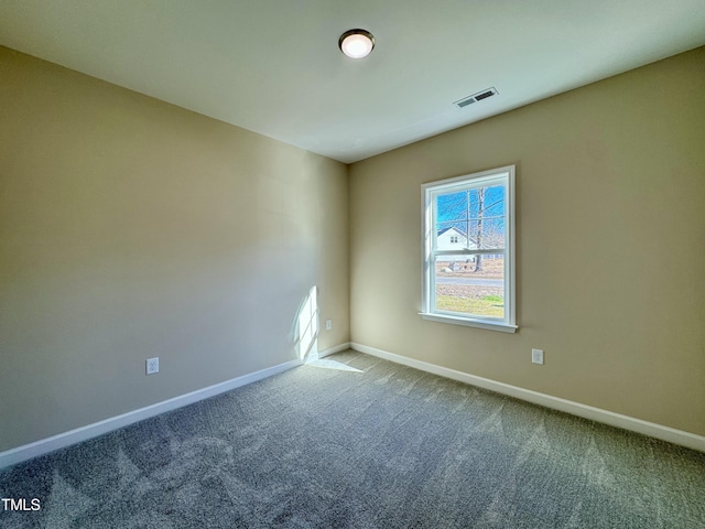 1572 Patterson Rd, Kinston, NC 28504 - unfurnished room featuring baseboards and carpet