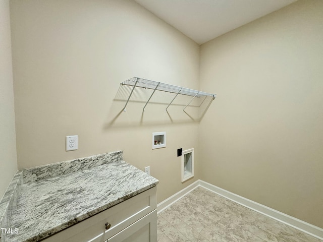 1572 Patterson Rd, Kinston, NC 28504 - washroom with baseboards, washer hookup, cabinet space, and electric dryer hookup