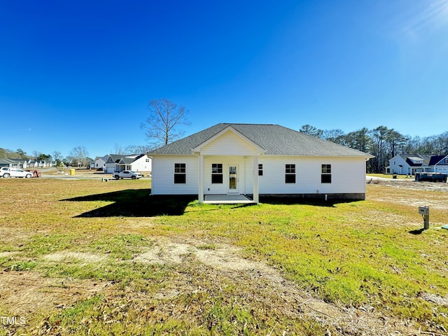1572 Patterson Rd, Kinston, NC 28504 - back of property with a lawn