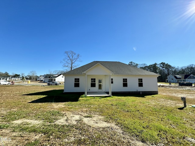1572 Patterson Rd, Kinston, NC 28504 - rear view of house with a yard