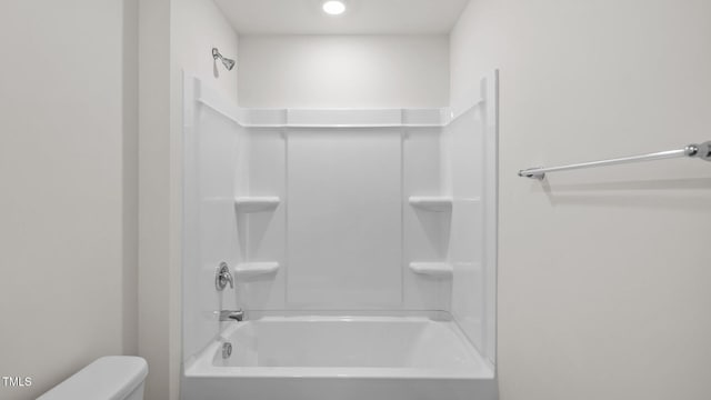 full bathroom featuring toilet and shower / bathtub combination