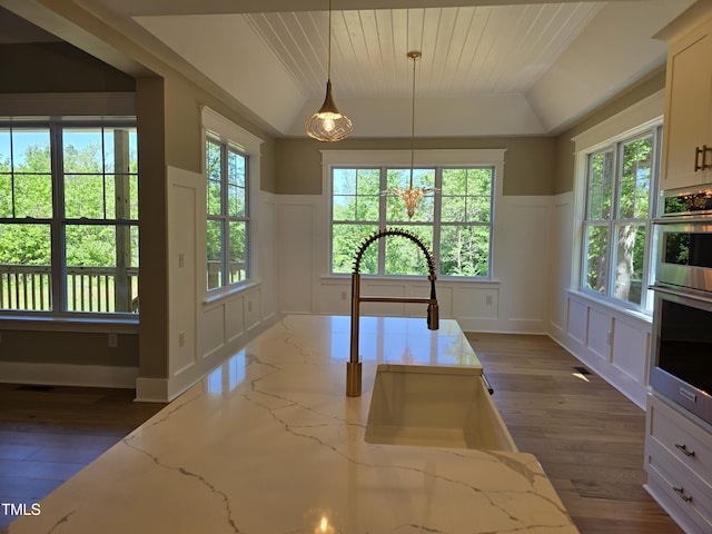 5480 Thom Rd, Mebane, NC 27302 - kitchen with wainscoting, pendant lighting, dark wood-type flooring, and a decorative wall