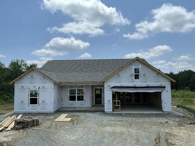 249 Spilona Way Unit 64, Four Oaks, NC 27524 - unfinished property with a garage and roof with shingles