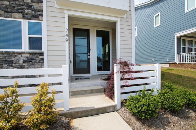 249 Wendover Pkwy, Pittsboro, NC 27312 - doorway to property featuring stone siding