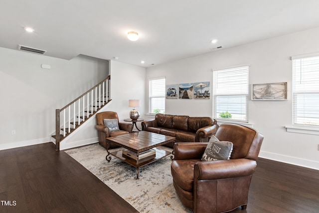 249 Wendover Pkwy, Pittsboro, NC 27312 - living area featuring stairway, baseboards, wood finished floors, plenty of natural light, and recessed lighting