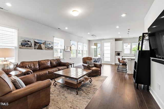 249 Wendover Pkwy, Pittsboro, NC 27312 - living area with dark wood finished floors, recessed lighting, and baseboards