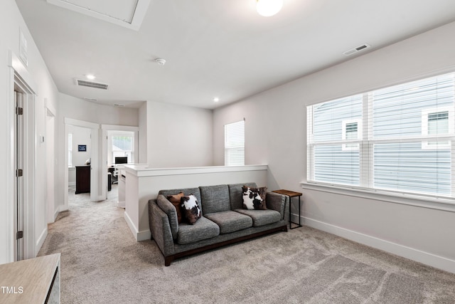 249 Wendover Pkwy, Pittsboro, NC 27312 - living room featuring light carpet, baseboards, and recessed lighting