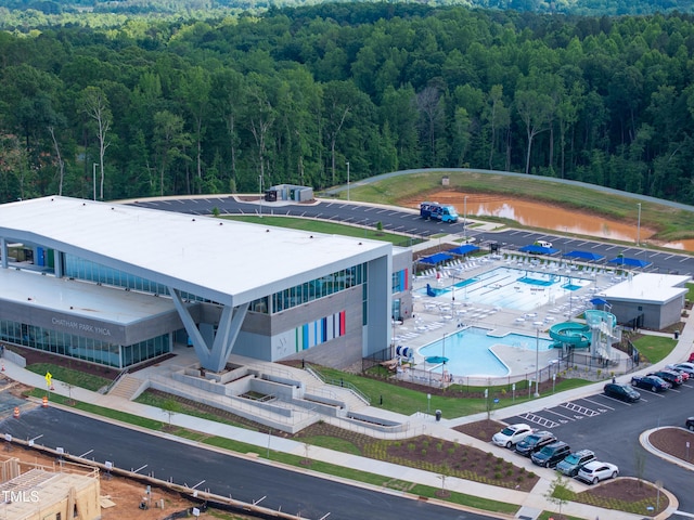 249 Wendover Pkwy, Pittsboro, NC 27312 - aerial view of a heavily wooded area and a pool area