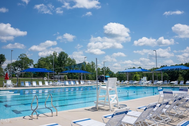 249 Wendover Pkwy, Pittsboro, NC 27312 - community pool with fence and a patio