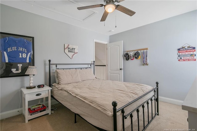 bedroom featuring light carpet, baseboards, and a ceiling fan