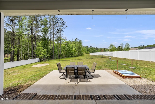 view of patio / terrace with a fenced backyard and outdoor dining area