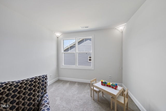 recreation room with visible vents, carpet, and baseboards
