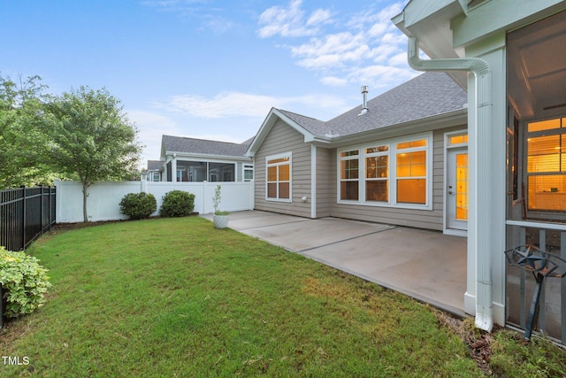 80 Bramble Ln, Clayton, NC 27527 - back of property with a patio, a shingled roof, and a sunroom