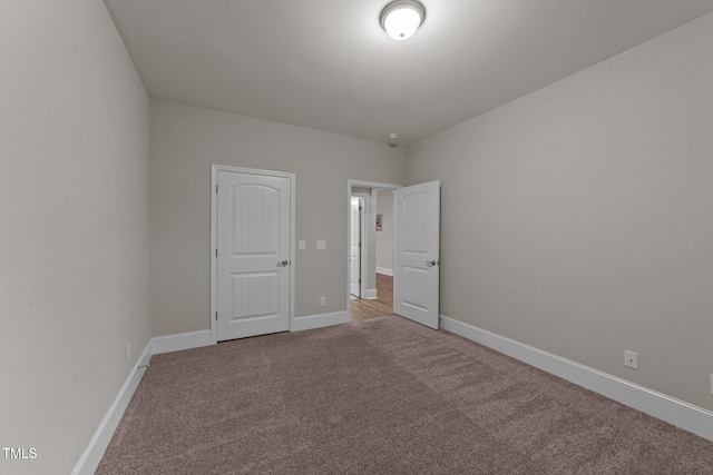 80 Bramble Ln, Clayton, NC 27527 - unfurnished bedroom featuring carpet flooring and baseboards