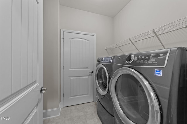 80 Bramble Ln, Clayton, NC 27527 - laundry room with separate washer and dryer and baseboards