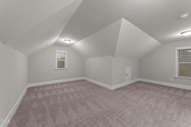 80 Bramble Ln, Clayton, NC 27527 - additional living space featuring light colored carpet, lofted ceiling, and baseboards