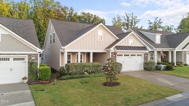 80 Bramble Ln, Clayton, NC 27527 - craftsman inspired home featuring board and batten siding, stone siding, a front lawn, and a garage
