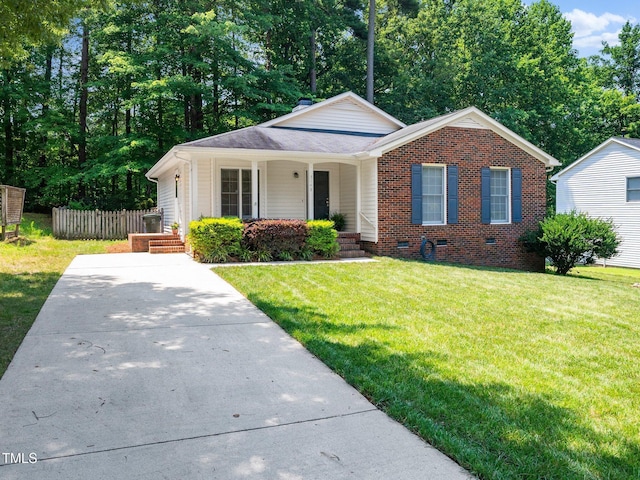 5148 Wallingford Dr, Raleigh, NC 27616 - view of front of house featuring a porch, crawl space, and brick siding