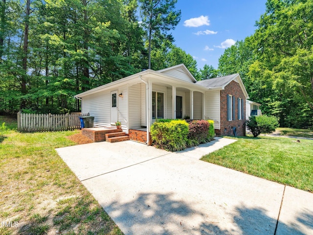 5148 Wallingford Dr, Raleigh, NC 27616 - view of front of home with a porch and brick siding