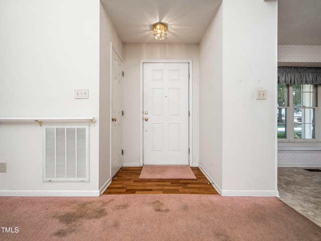 5148 Wallingford Dr, Raleigh, NC 27616 - foyer with carpet and baseboards