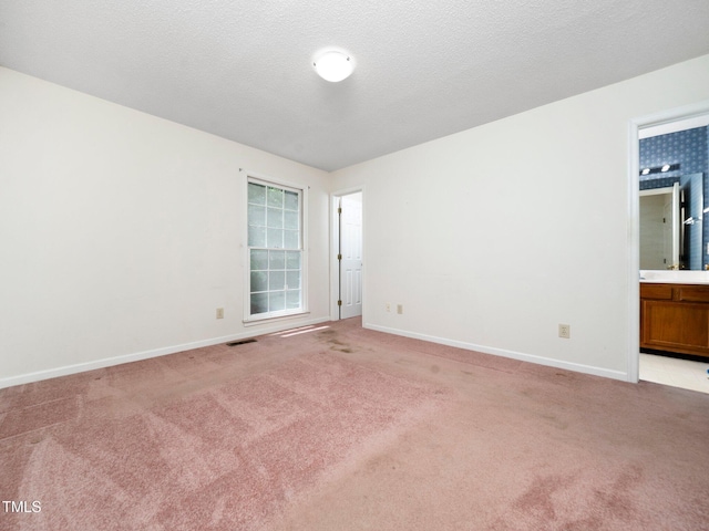 5148 Wallingford Dr, Raleigh, NC 27616 - empty room featuring light colored carpet and a textured ceiling