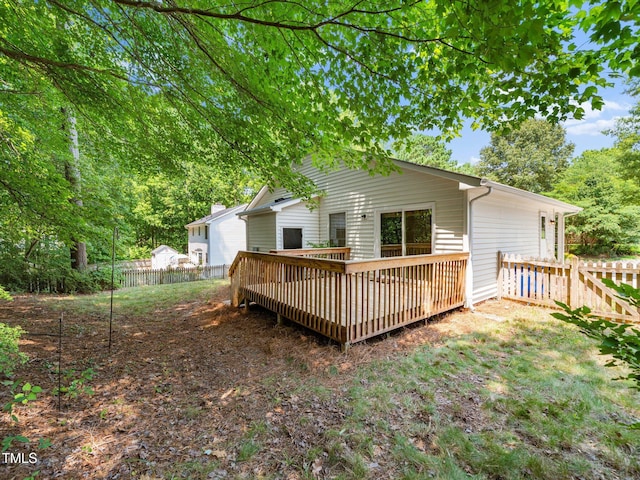 5148 Wallingford Dr, Raleigh, NC 27616 - rear view of property with a fenced backyard and a deck