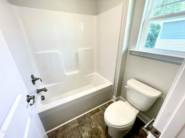 full bath featuring toilet and shower / tub combination