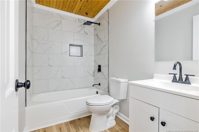 full bath with crown molding, toilet, wood finished floors, vanity, and shower / washtub combination