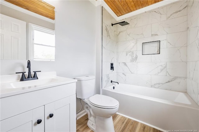 full bath featuring wood finished floors, toilet, vanity, and shower / bathtub combination