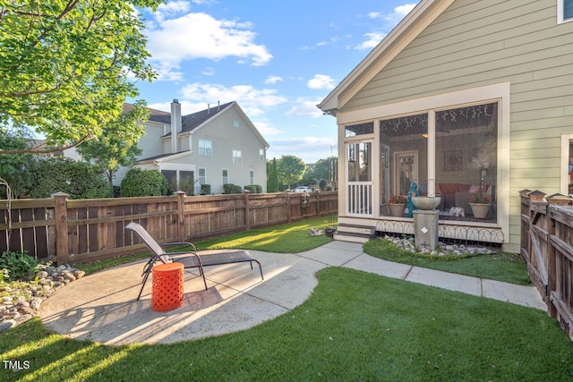 997 Windy Rd, Apex, NC 27502 - view of yard with a sunroom and a patio