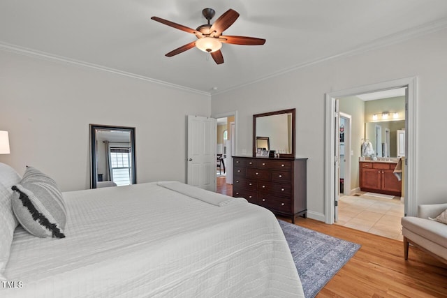 997 Windy Rd, Apex, NC 27502 - bedroom with ornamental molding, light wood-style flooring, ceiling fan, and ensuite bath