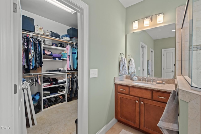 997 Windy Rd, Apex, NC 27502 - full bath with vanity and a walk in closet