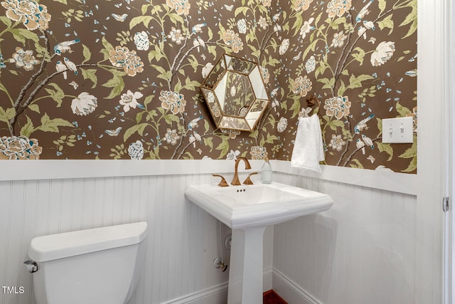 129 Trellingwood Dr, Morrisville, NC 27560 - bathroom with a wainscoted wall, toilet, and wallpapered walls
