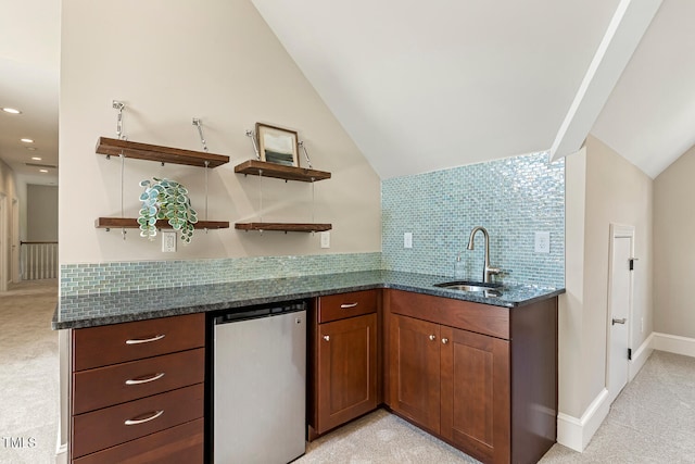 129 Trellingwood Dr, Morrisville, NC 27560 - kitchen featuring refrigerator, a sink, open shelves, dark stone counters, and lofted ceiling