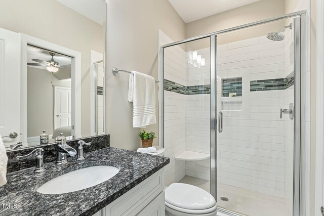 129 Trellingwood Dr, Morrisville, NC 27560 - full bathroom with vanity, toilet, a shower stall, and ceiling fan