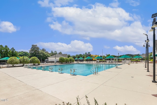 129 Trellingwood Dr, Morrisville, NC 27560 - community pool featuring a patio