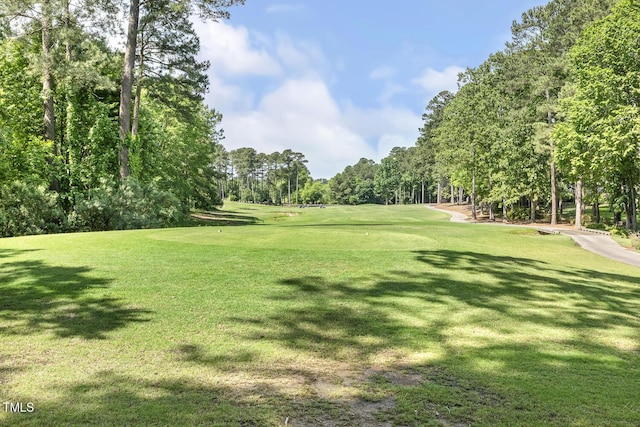 129 Trellingwood Dr, Morrisville, NC 27560 - view of community featuring view of scattered trees, a yard, and view of golf course