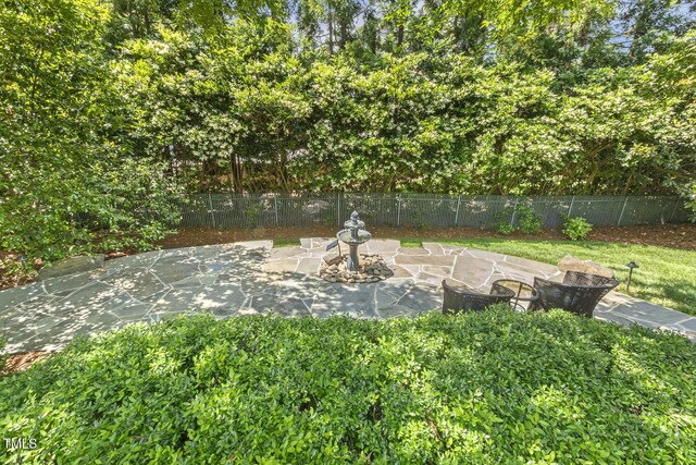 129 Trellingwood Dr, Morrisville, NC 27560 - view of yard with a patio area