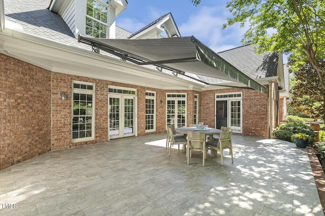 129 Trellingwood Dr, Morrisville, NC 27560 - view of patio with french doors and outdoor dining space