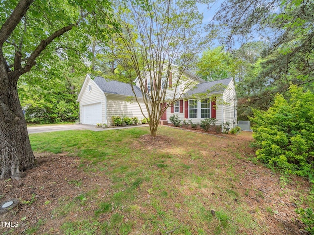 5504 Cumberland Plain Dr, Raleigh, NC 27616 - view of front of home with an attached garage, a front lawn, and concrete driveway